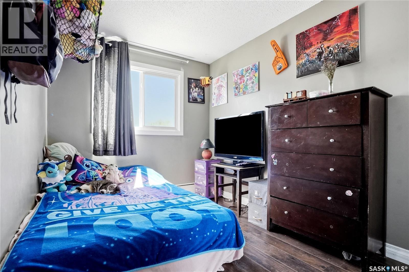 7 115 Acadia Drive, Saskatoon, SK - Indoor Photo Showing Bedroom