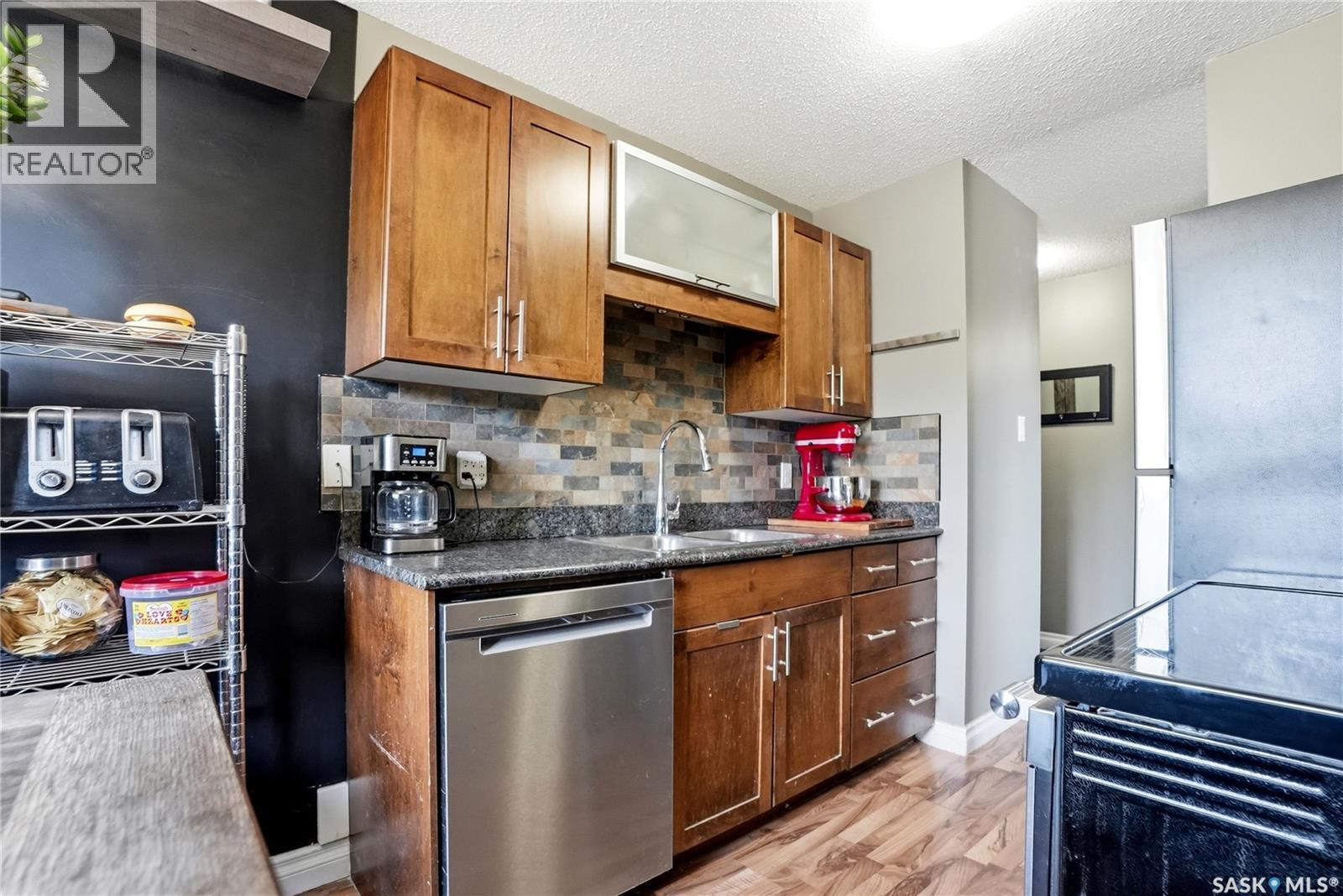 7 115 Acadia Drive, Saskatoon, SK - Indoor Photo Showing Kitchen