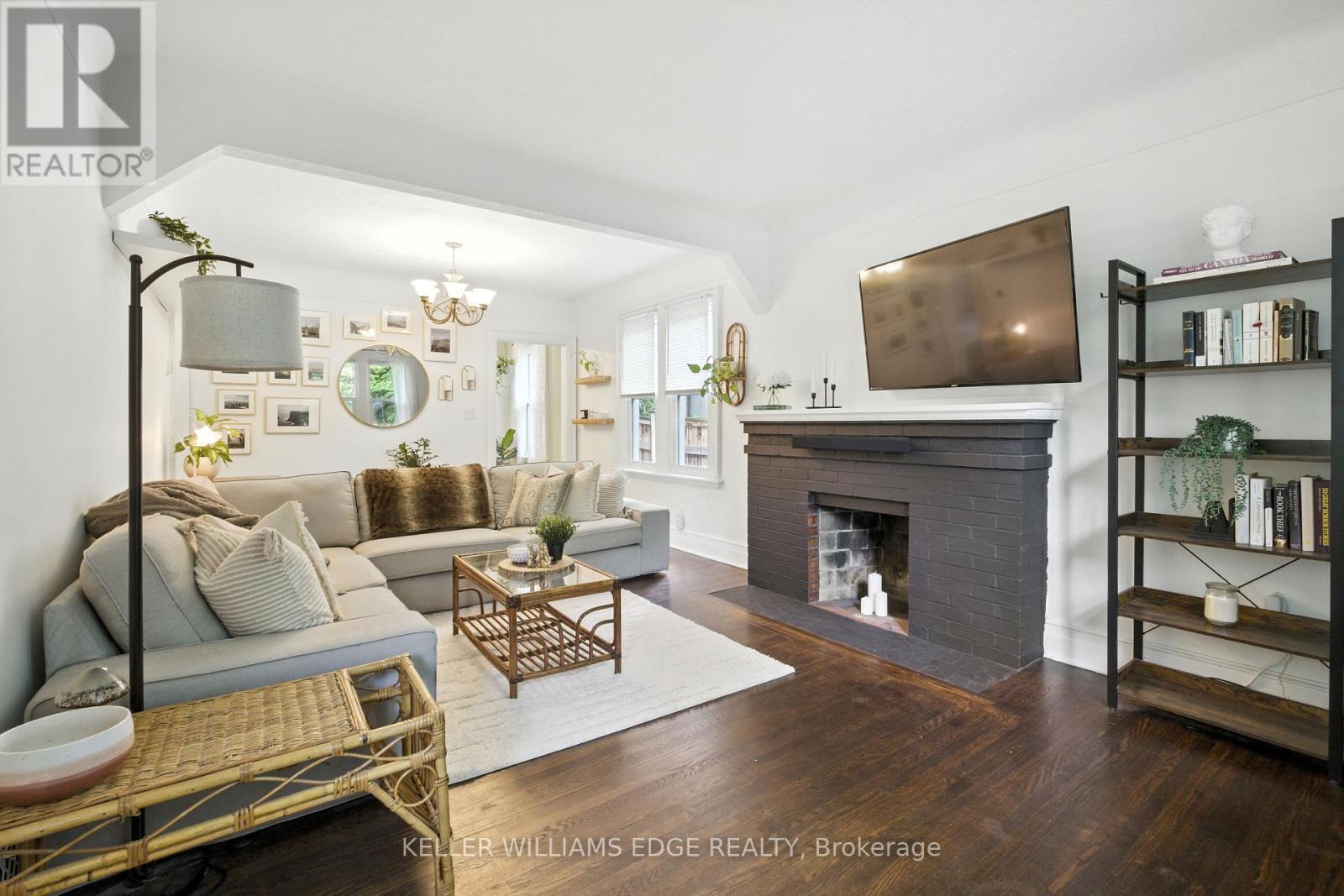1999 Main Street W, Hamilton, ON - Indoor Photo Showing Living Room With Fireplace