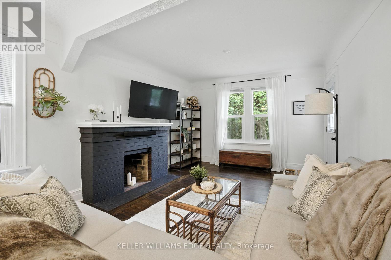 1999 Main Street W, Hamilton, ON - Indoor Photo Showing Living Room With Fireplace