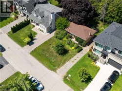 Expansive corner lot with mature landscaping - 