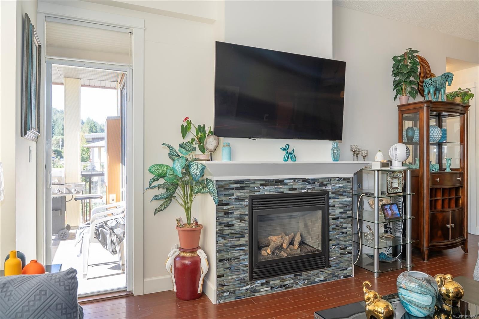 #402-3210 Jacklin Rd, Langford, BC - Indoor Photo Showing Living Room With Fireplace