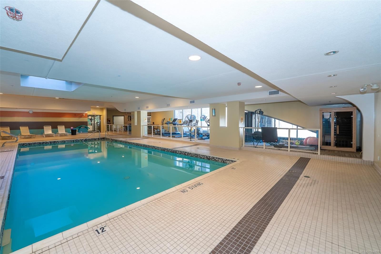 #402-3210 Jacklin Rd, Langford, BC - Indoor Photo Showing Other Room With In Ground Pool