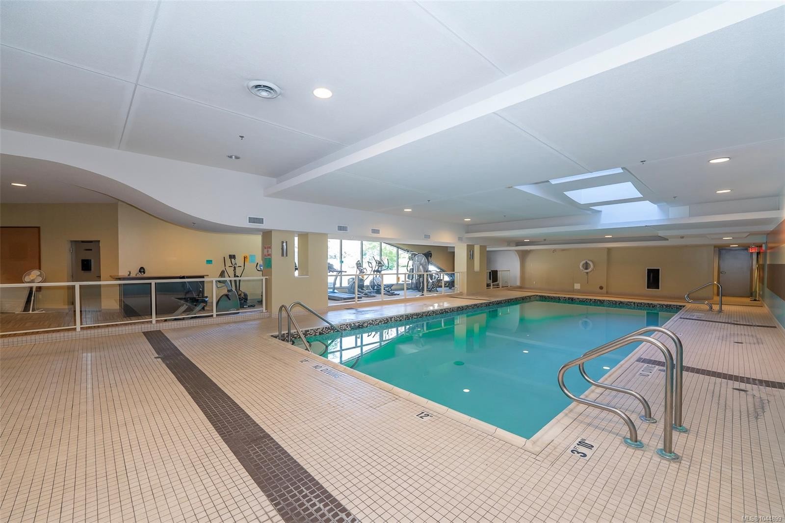 #402-3210 Jacklin Rd, Langford, BC - Indoor Photo Showing Other Room With In Ground Pool