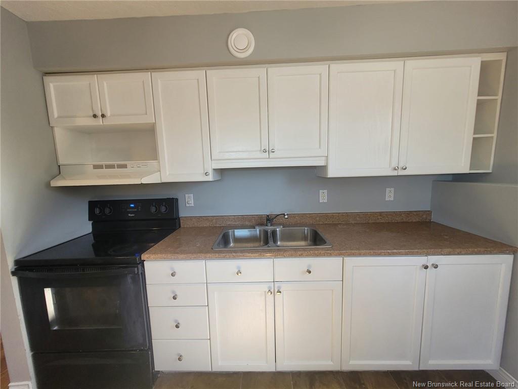 71-73 Mill Rd, Moncton, NB - Indoor Photo Showing Kitchen With Double Sink