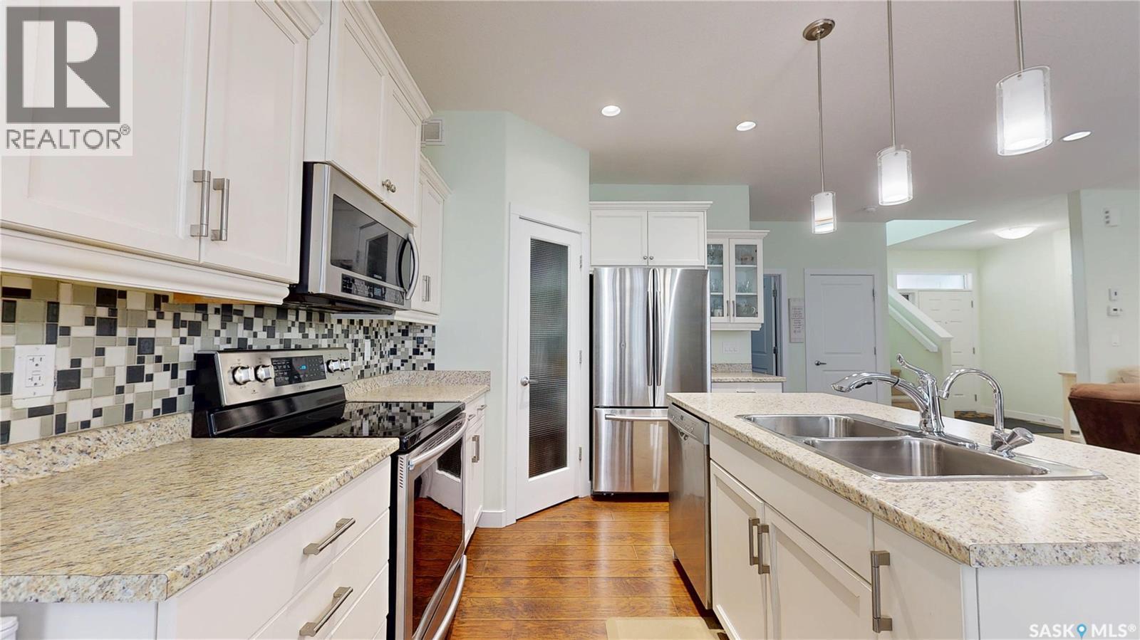 2632 Makowsky Crescent, Regina, SK - Indoor Photo Showing Kitchen With Stainless Steel Kitchen With Double Sink With Upgraded Kitchen