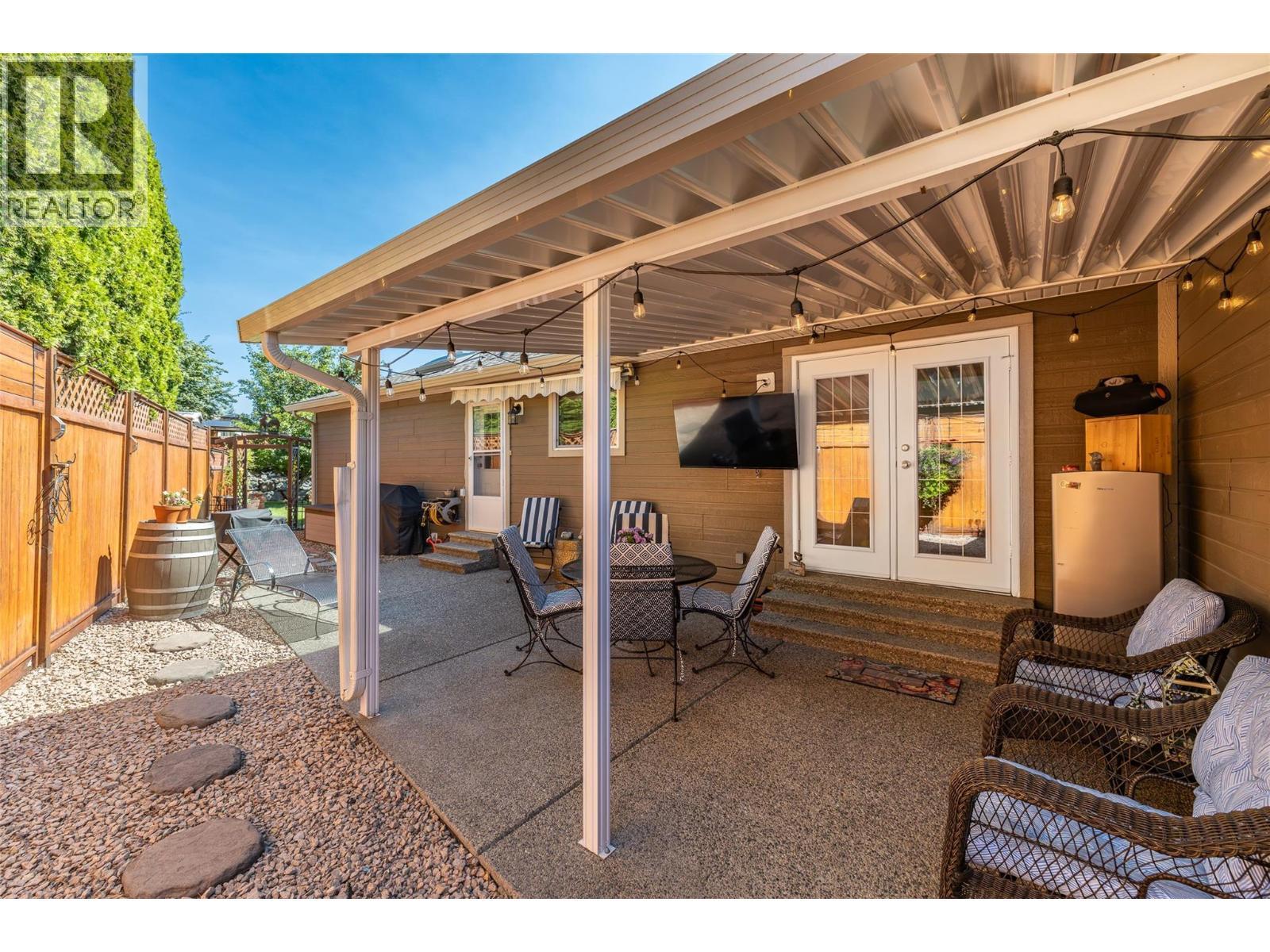 Side Yard with covered patio - 2208 Mimosa Drive, West Kelowna, BC