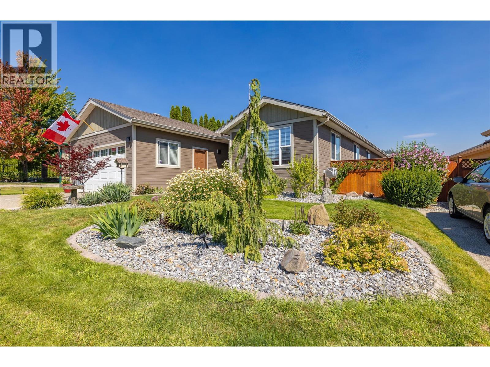 Just across the street from 2 Eagles Golf Course - 2208 Mimosa Drive, West Kelowna, BC