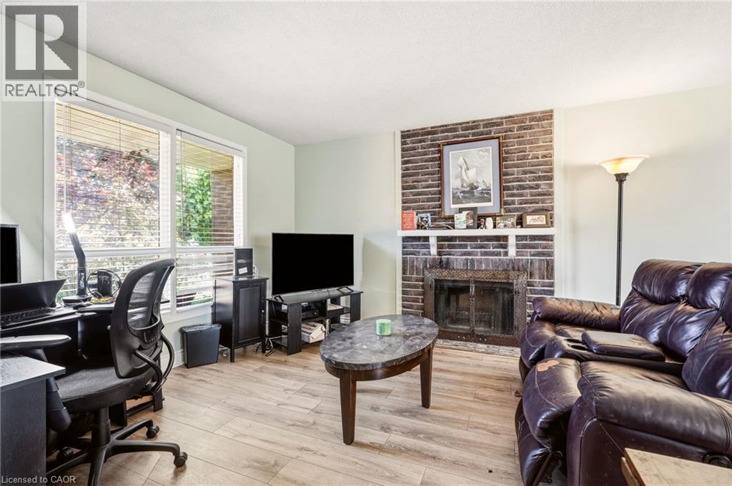 4 Eileen Street, Waterdown, ON - Indoor Photo Showing Living Room With Fireplace