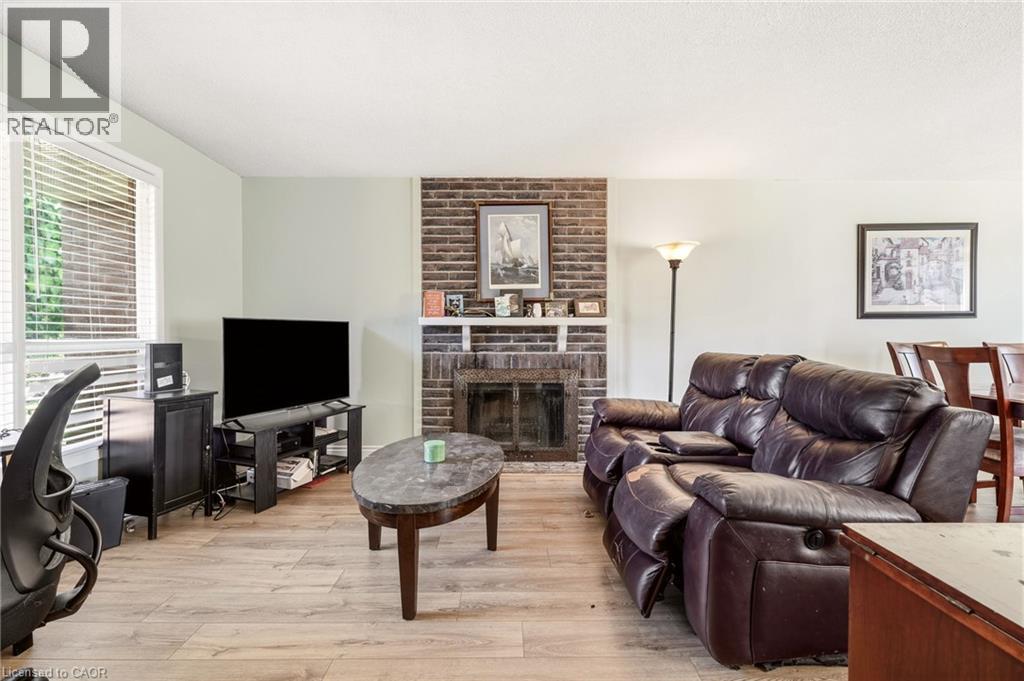 4 Eileen Street, Waterdown, ON - Indoor Photo Showing Living Room With Fireplace