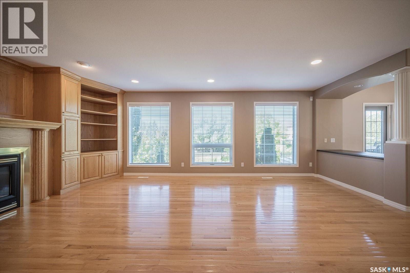 226 Horlick Crescent, Saskatoon, SK - Indoor Photo Showing Other Room With Fireplace