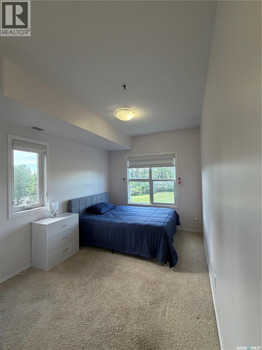 210 1220 Blackfoot Drive, Regina, SK - Indoor Photo Showing Bedroom