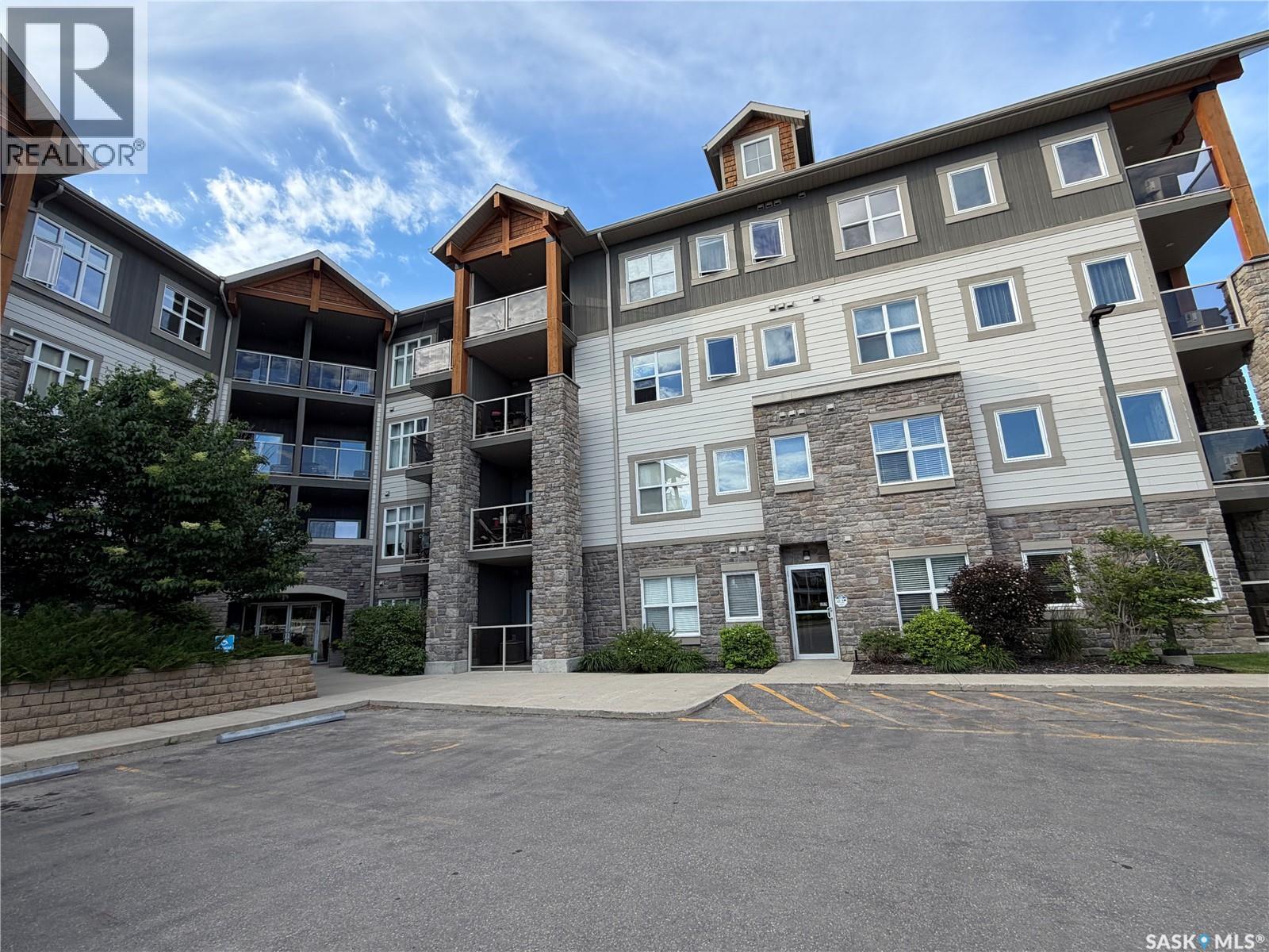 210 1220 Blackfoot Drive, Regina, SK - Outdoor With Balcony With Facade