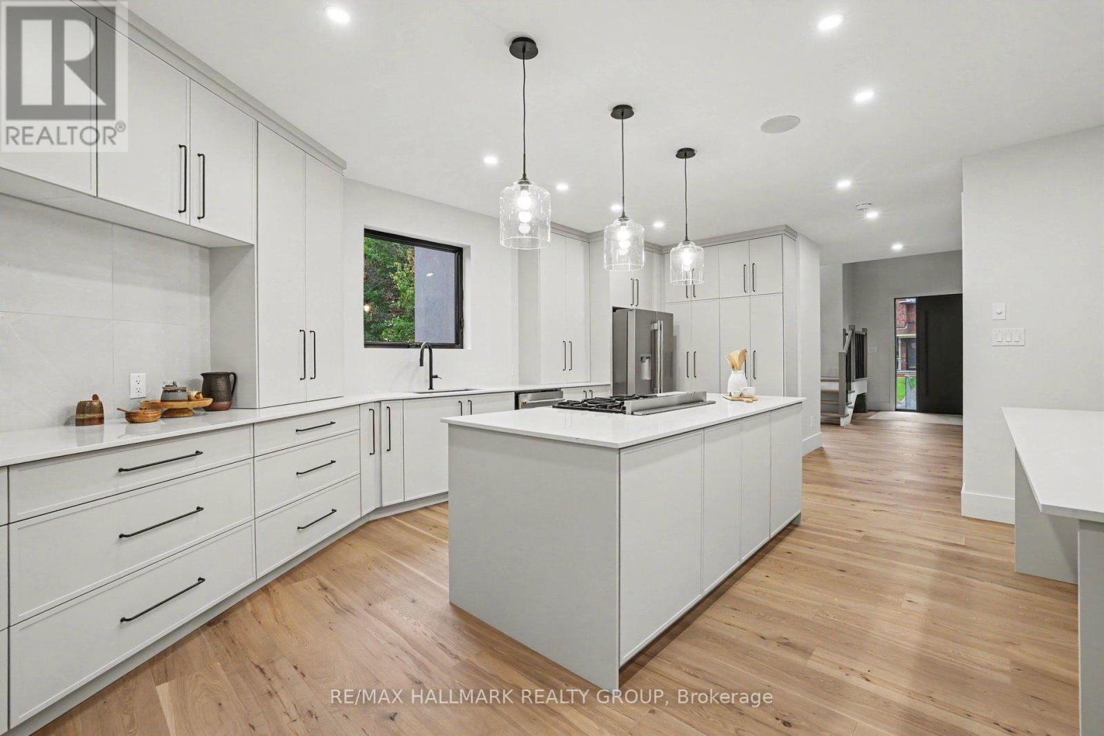 Custom flr to ceiling cabinetry. - 218 Woodland Avenue, Ottawa, ON - Indoor Photo Showing Kitchen With Upgraded Kitchen