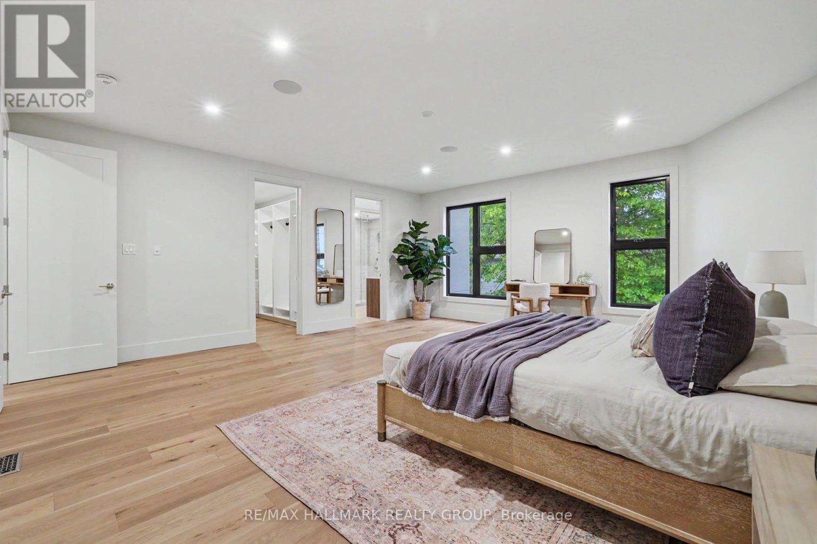 Built-in speakers ~ pot-lighting ~ WIC - 218 Woodland Avenue, Ottawa, ON - Indoor Photo Showing Bedroom