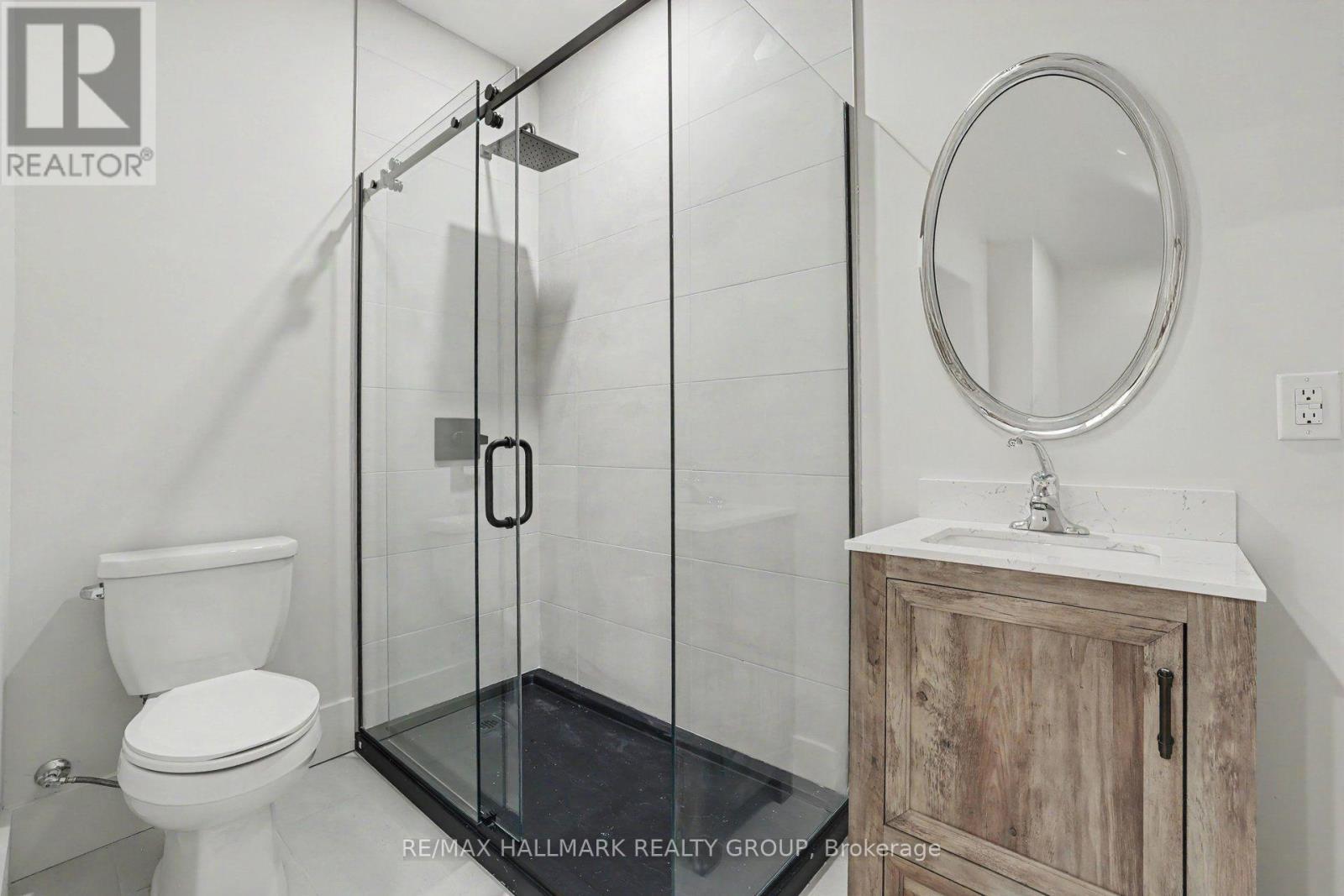 Convenient full bathroom for lower level. - 218 Woodland Avenue, Ottawa, ON - Indoor Photo Showing Bathroom