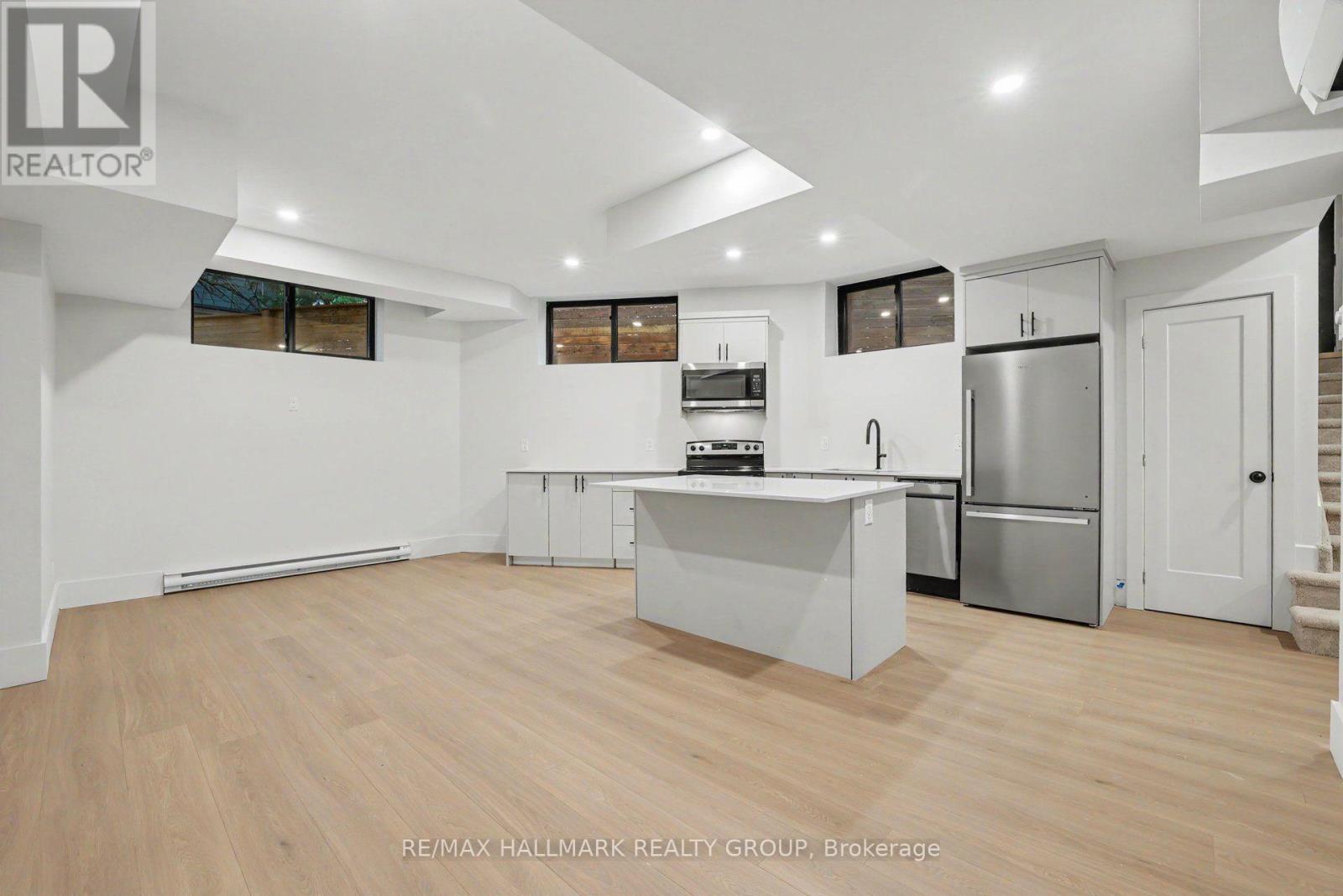 Lots of windows and pot-lighting. - 218 Woodland Avenue, Ottawa, ON - Indoor Photo Showing Kitchen