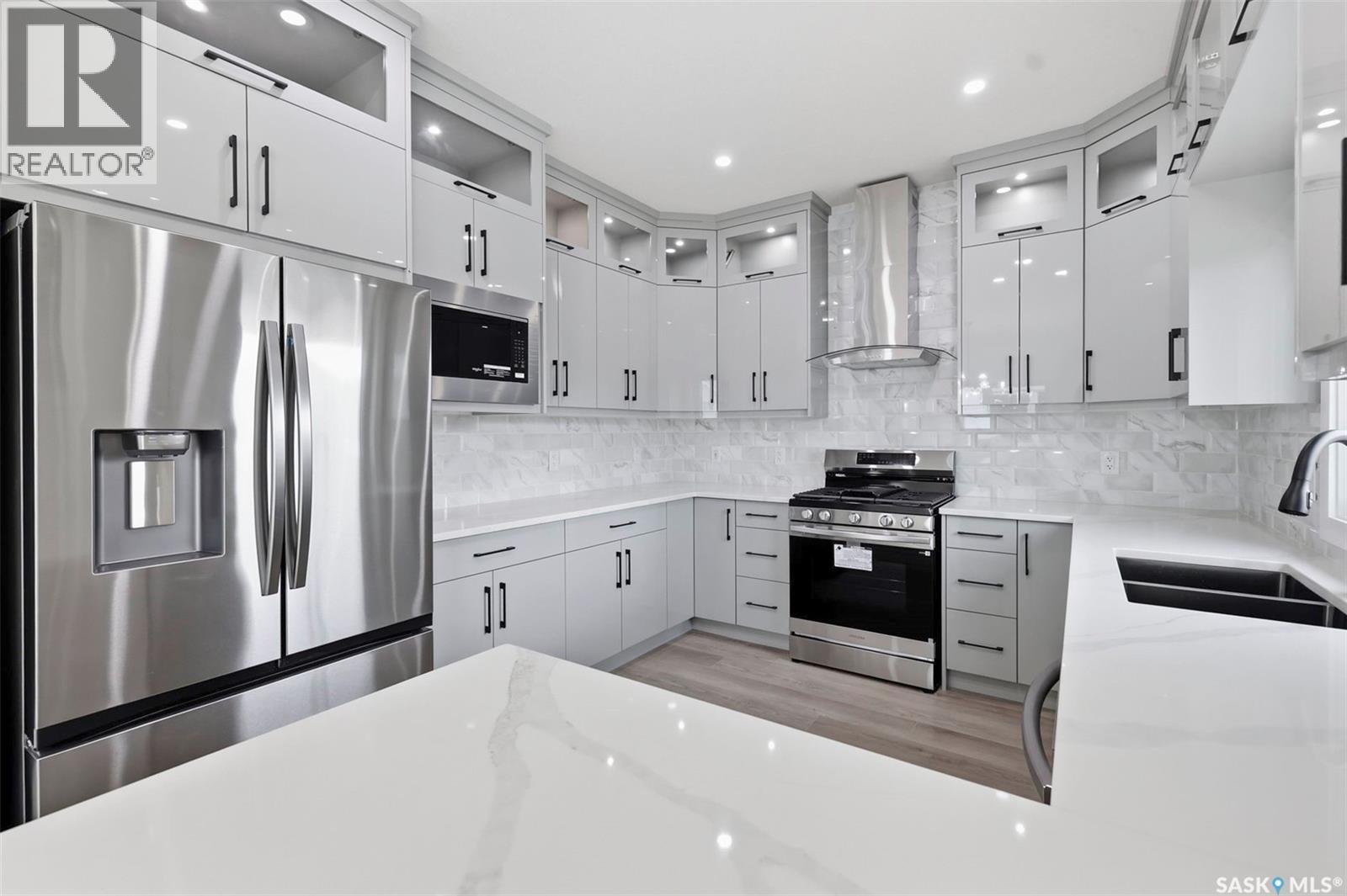 1215 Nightingale Terrace, Saskatoon, SK - Indoor Photo Showing Kitchen With Double Sink With Upgraded Kitchen