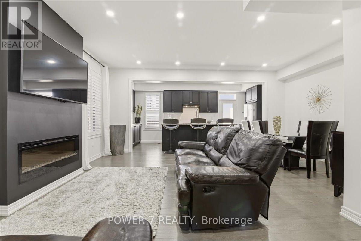 94 Conarty Crescent, Whitby, ON - Indoor Photo Showing Living Room With Fireplace