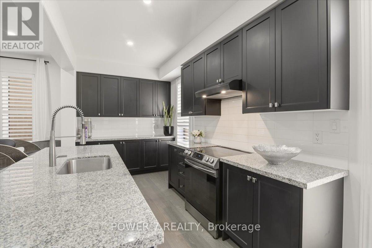 94 Conarty Crescent, Whitby, ON - Indoor Photo Showing Kitchen With Upgraded Kitchen