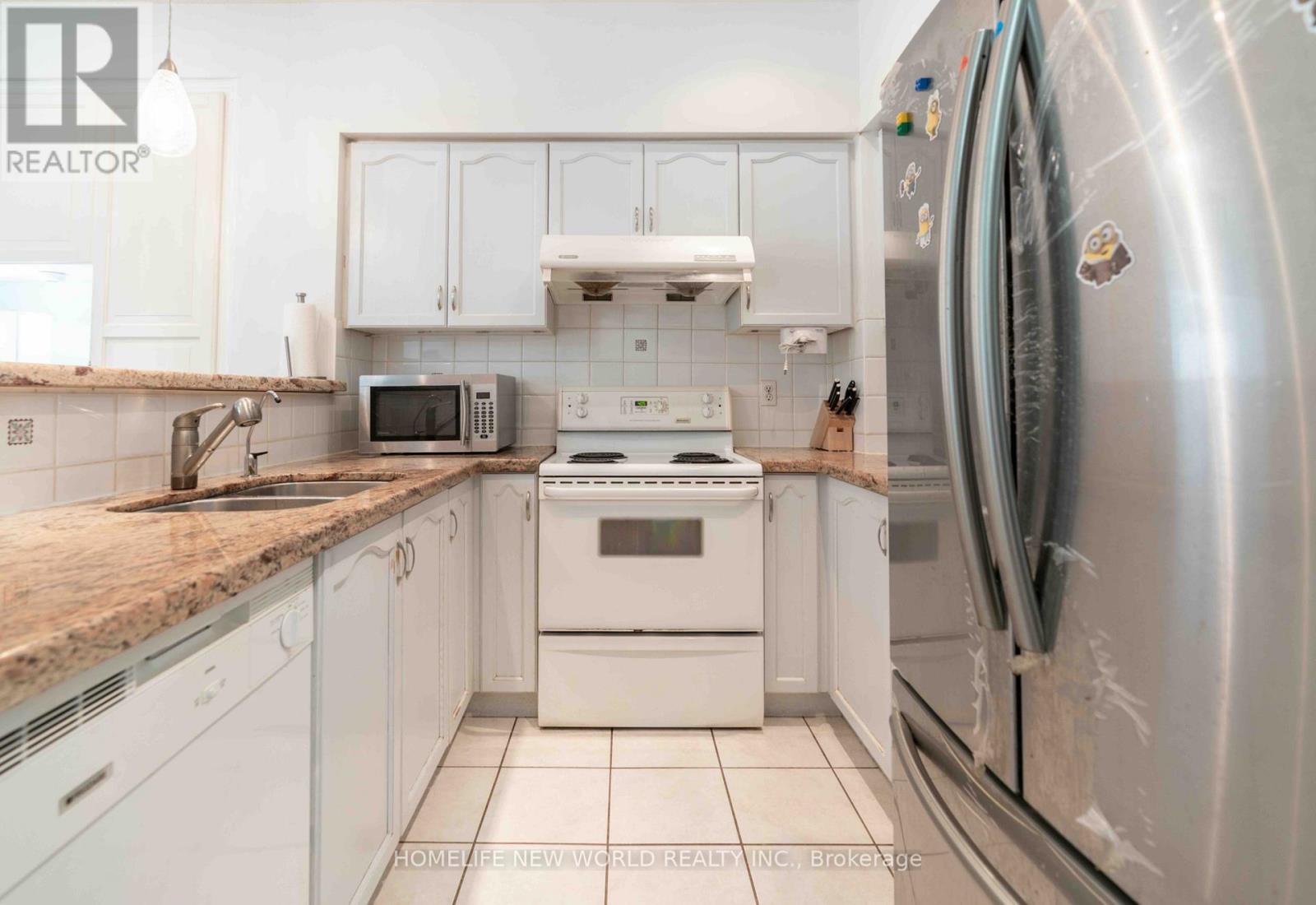 12 - 21 St. Moritz Way, Markham, ON - Indoor Photo Showing Kitchen With Double Sink