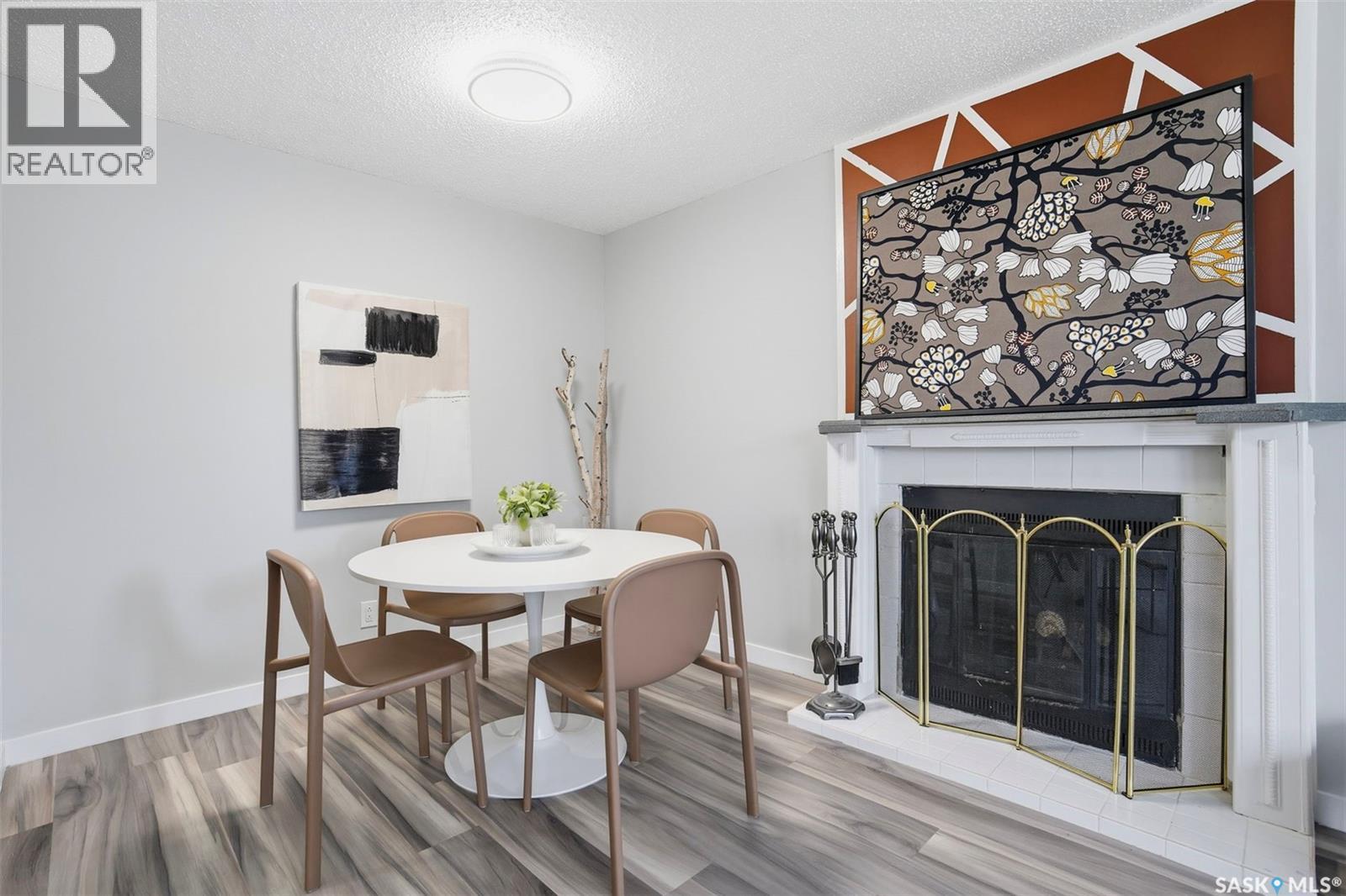 1721 E Avenue N, Saskatoon, SK - Indoor Photo Showing Dining Room With Fireplace