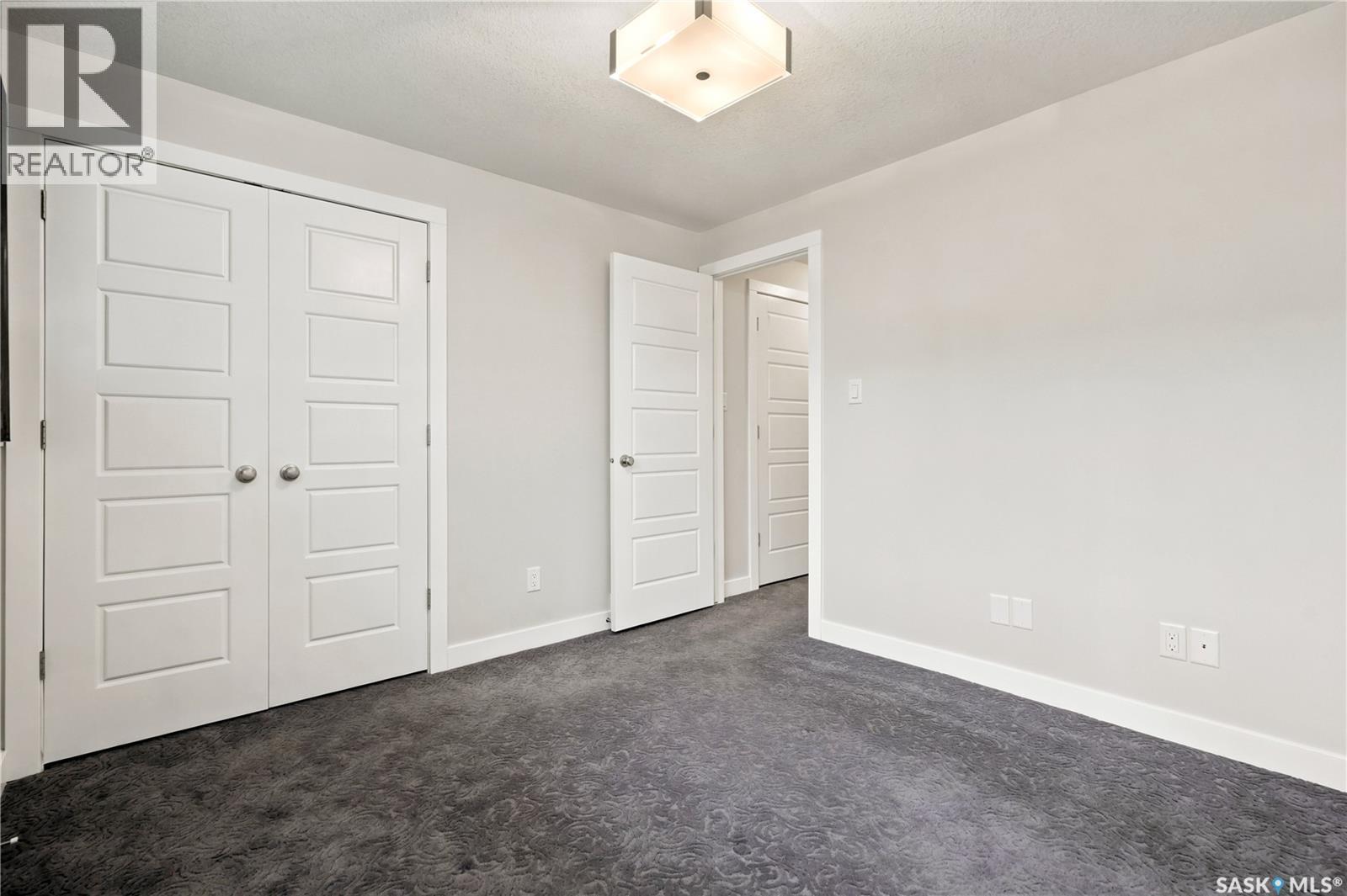 101 3229 Elgaard Drive, Regina, SK - Indoor Photo Showing Other Room