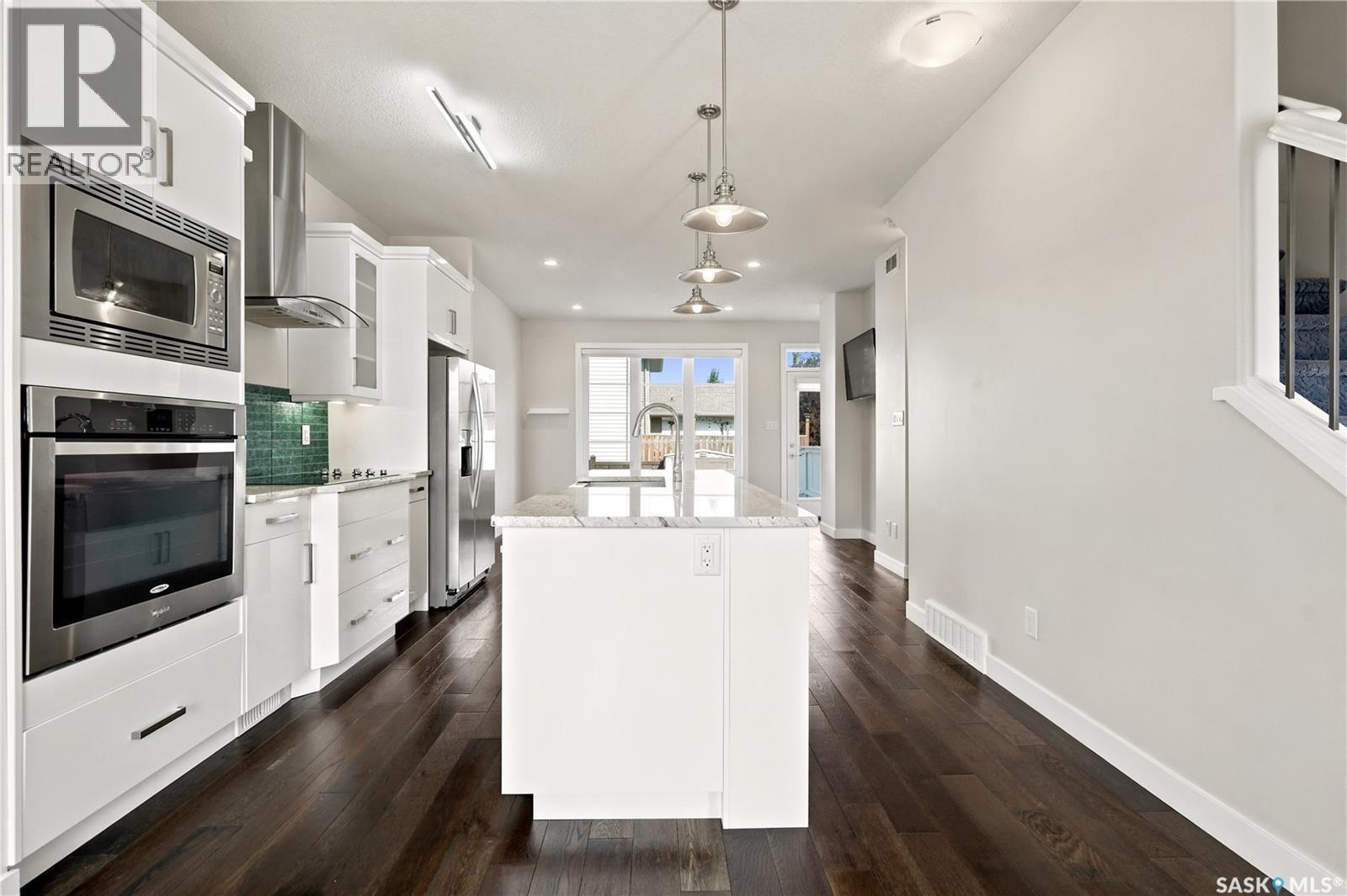 101 3229 Elgaard Drive, Regina, SK - Indoor Photo Showing Kitchen With Upgraded Kitchen