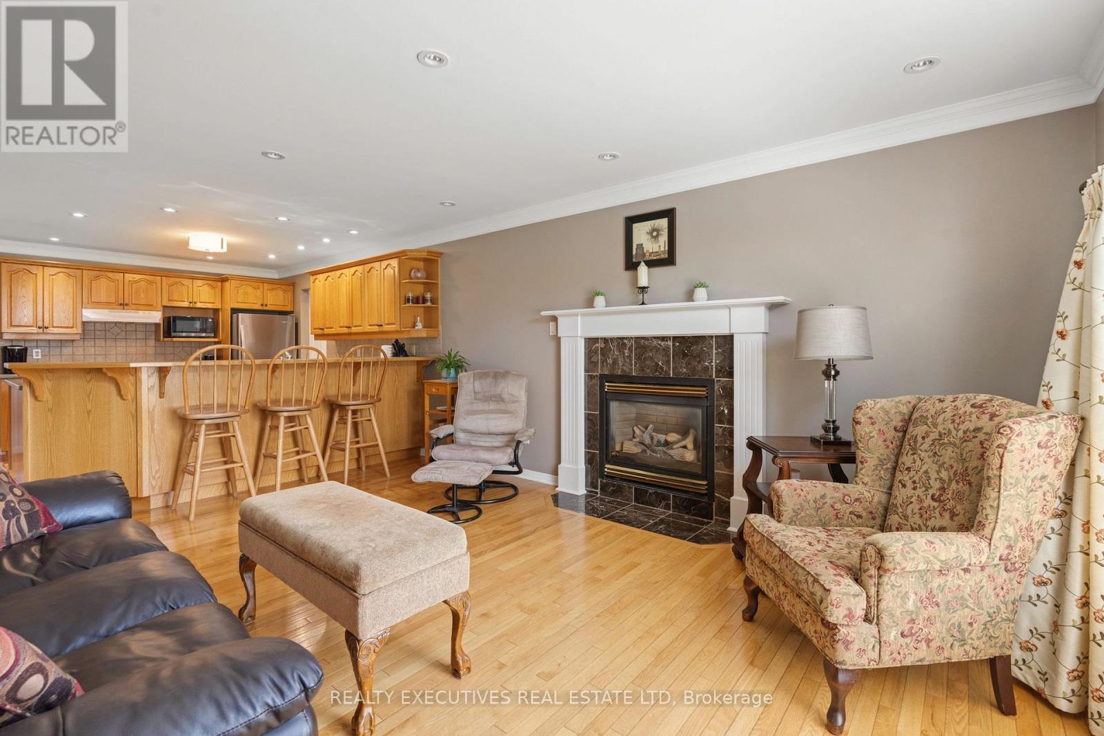 Living Room w/ Natural Gas Fireplace - 434 Queen Street, North Dundas, ON - Indoor Photo Showing Living Room With Fireplace