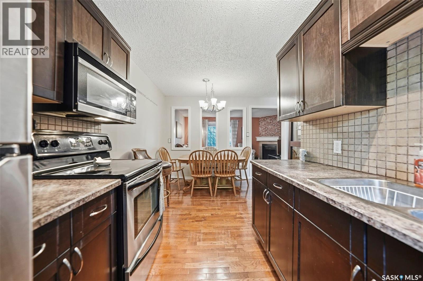 402 2703 Spadina Crescent E, Saskatoon, SK - Indoor Photo Showing Kitchen