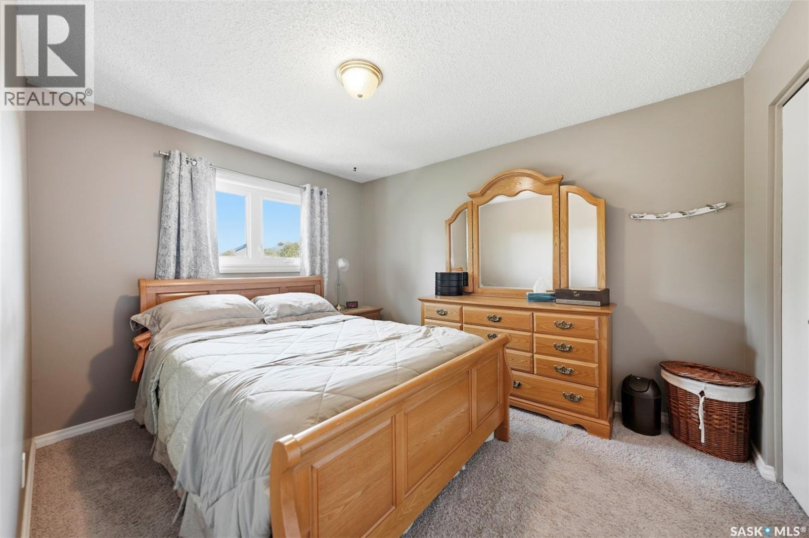 402 2703 Spadina Crescent E, Saskatoon, SK - Indoor Photo Showing Bedroom