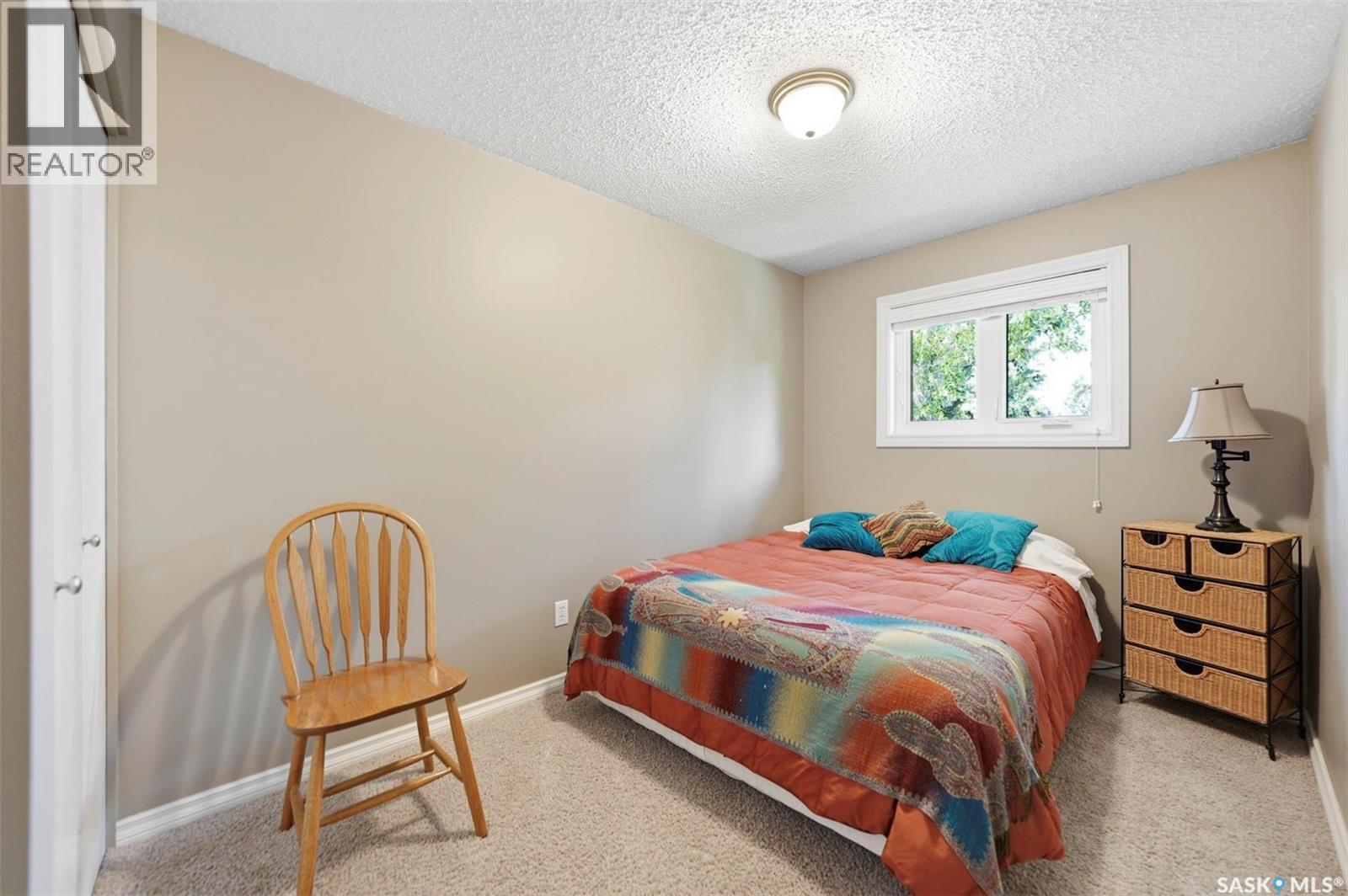 402 2703 Spadina Crescent E, Saskatoon, SK - Indoor Photo Showing Bedroom