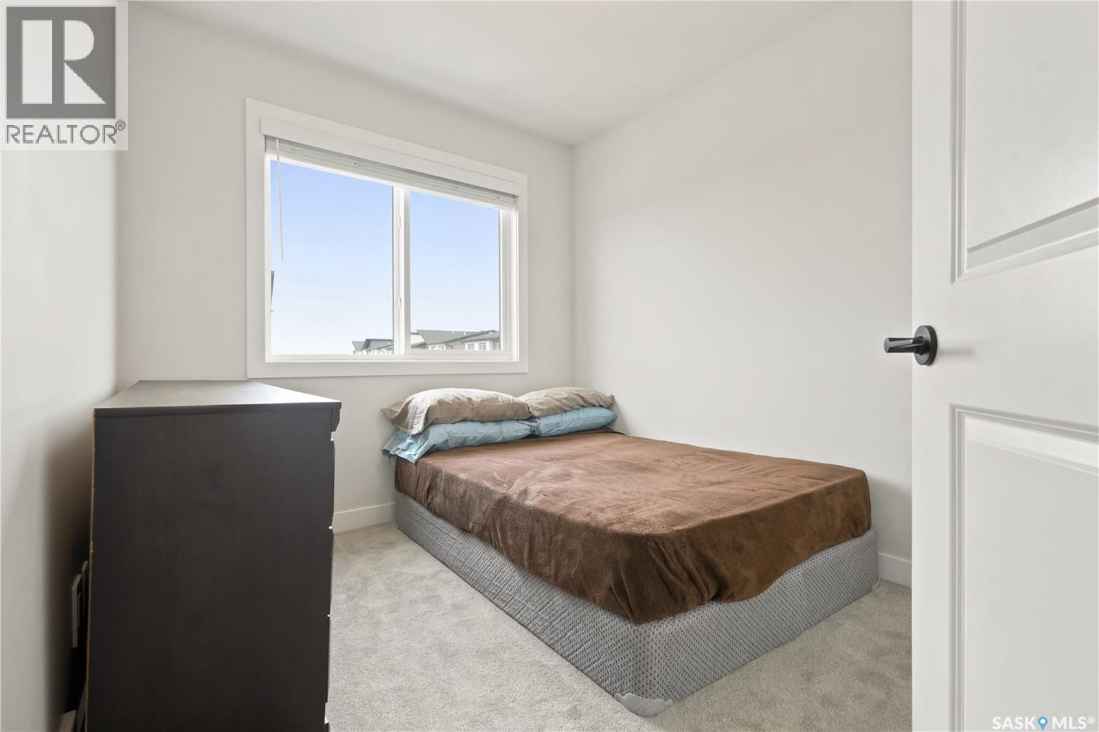 41 651 Dubois Crescent, Saskatoon, SK - Indoor Photo Showing Bedroom