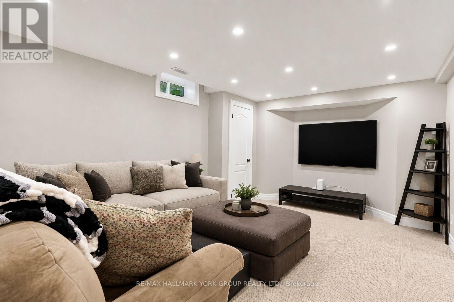Media room in basement (virtually staged) - 111 Whispering Pine Trail, Aurora, ON - Indoor