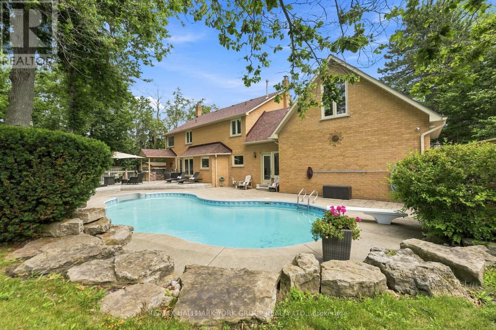 111 Whispering Pine Trail, Aurora, ON - Outdoor With In Ground Pool With Backyard With Exterior