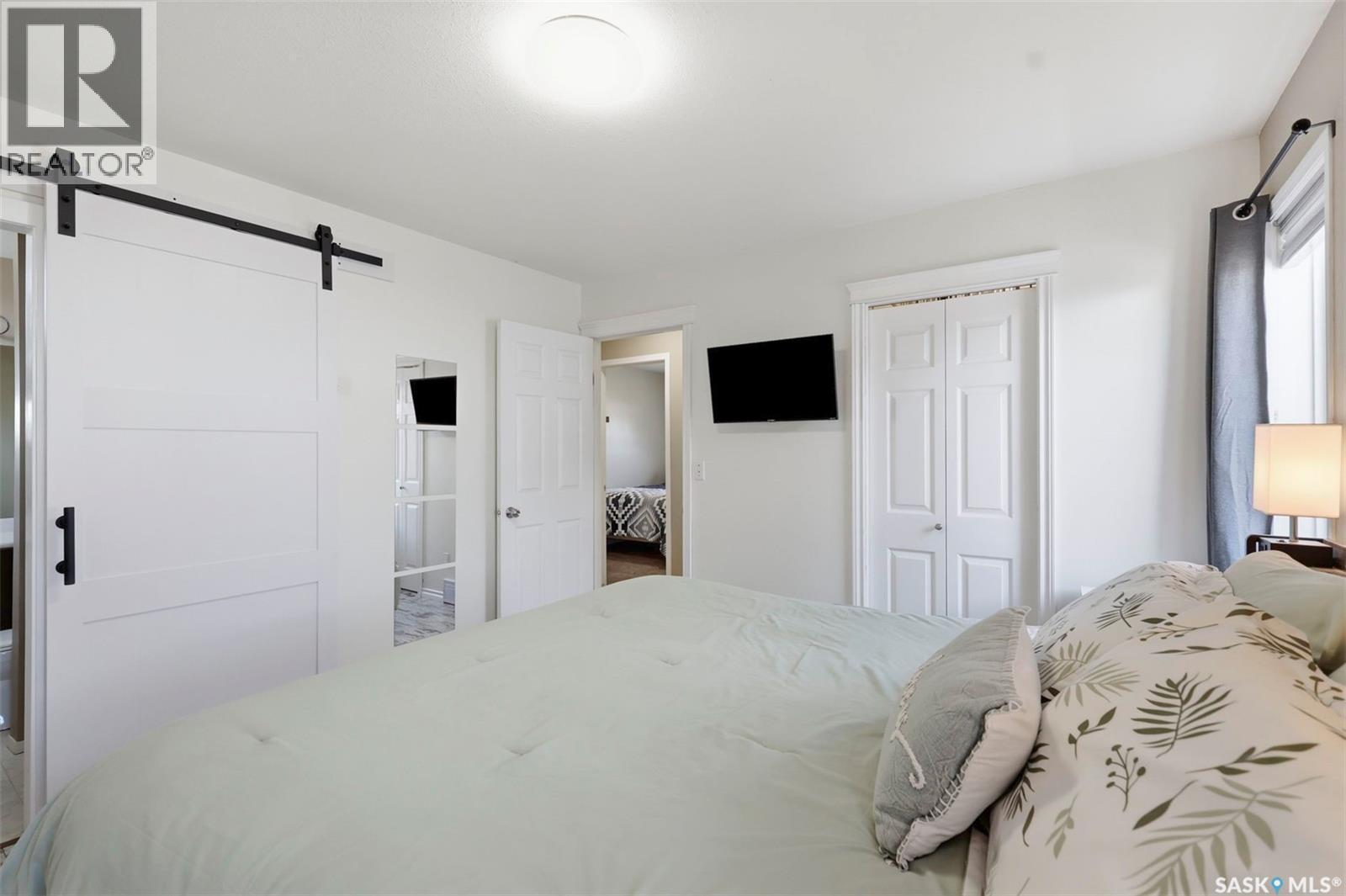 201 1St Avenue N, Warman, SK - Indoor Photo Showing Bedroom