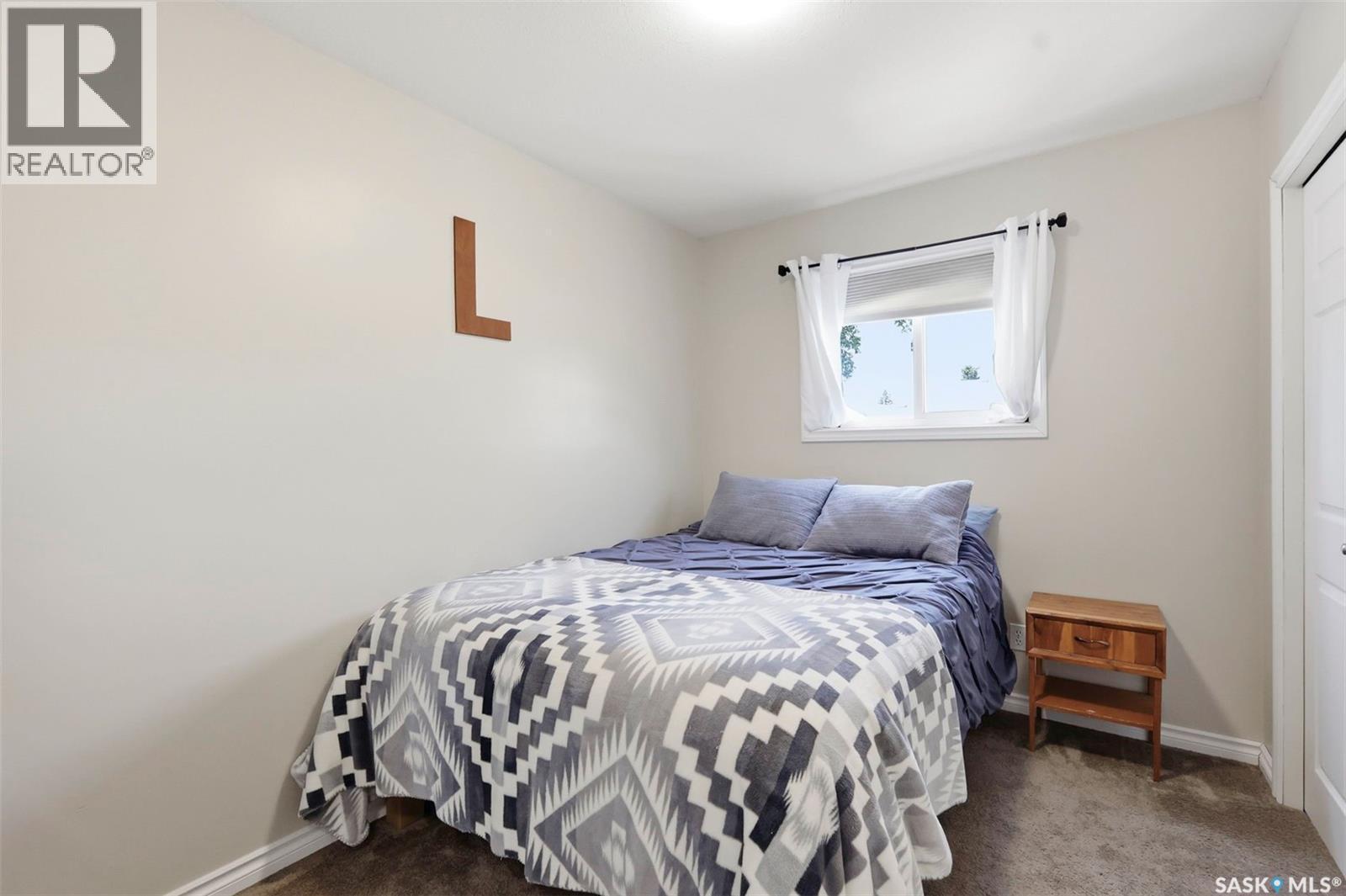 201 1St Avenue N, Warman, SK - Indoor Photo Showing Bedroom