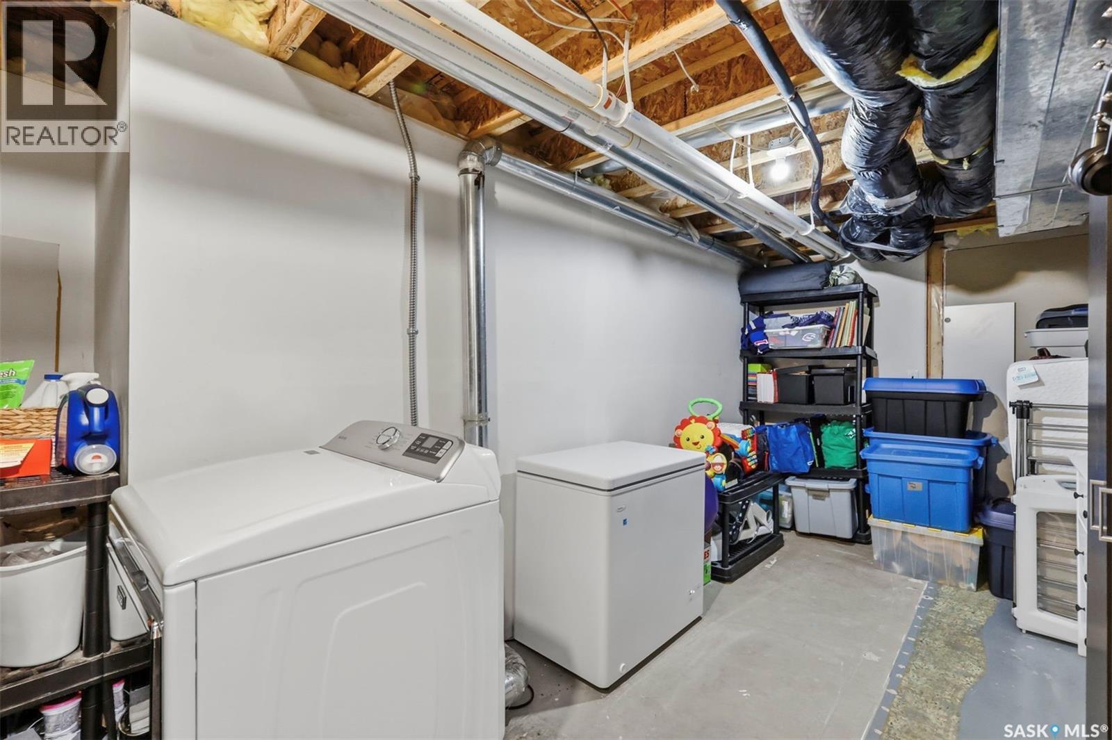 201 1St Avenue N, Warman, SK - Indoor Photo Showing Laundry Room
