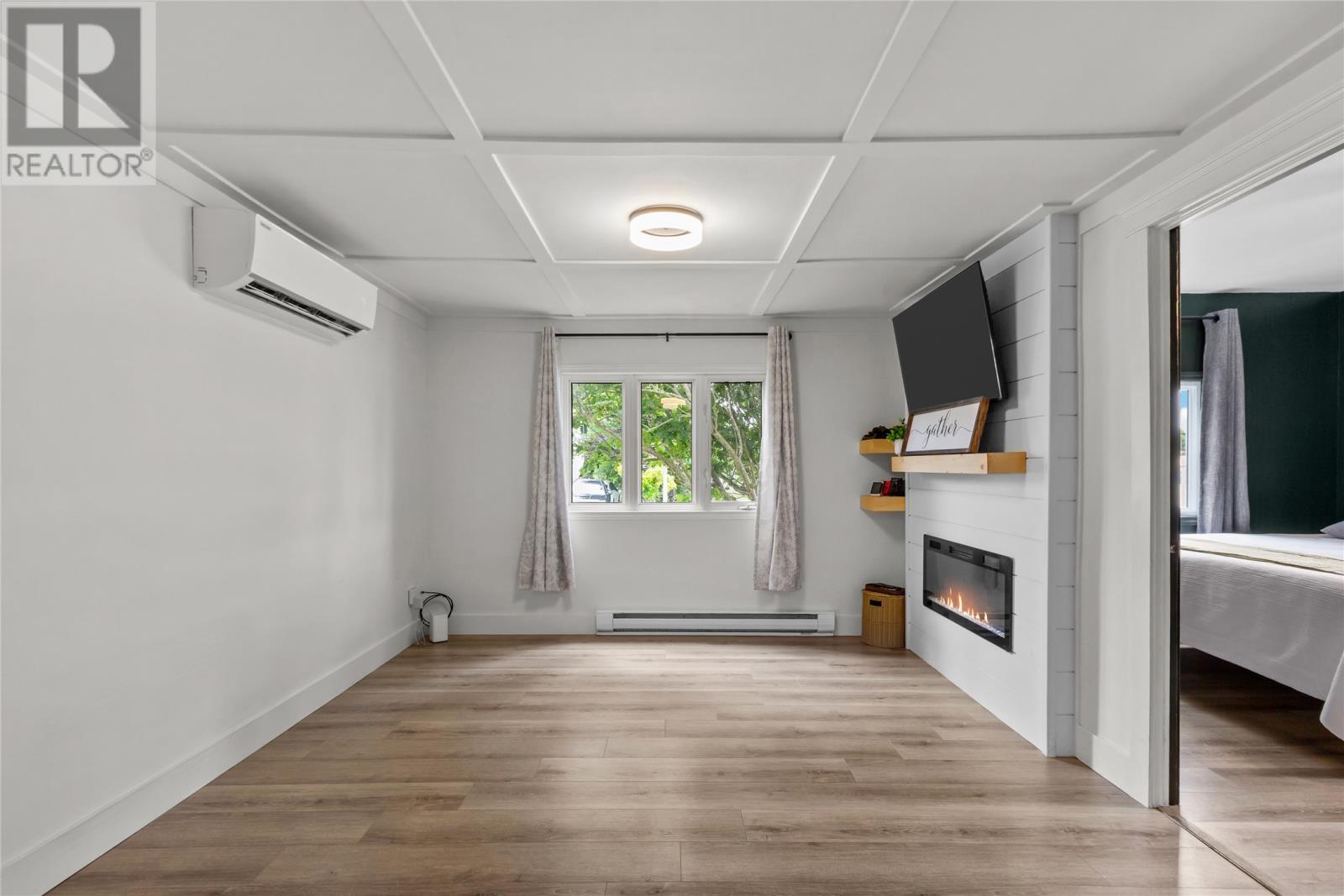 6 Willow Drive, Paradise, NL - Indoor With Fireplace
