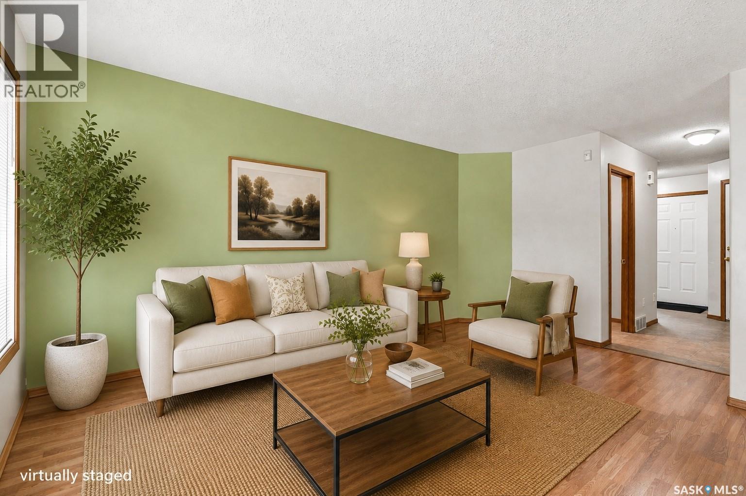 2 110 Keevil Crescent, Saskatoon, SK - Indoor Photo Showing Living Room