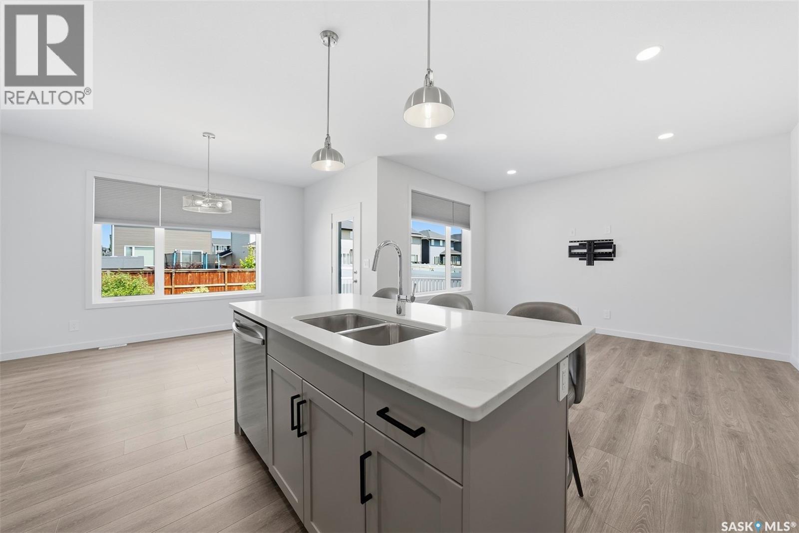 377 Germain Manor, Saskatoon, SK - Indoor Photo Showing Kitchen With Double Sink