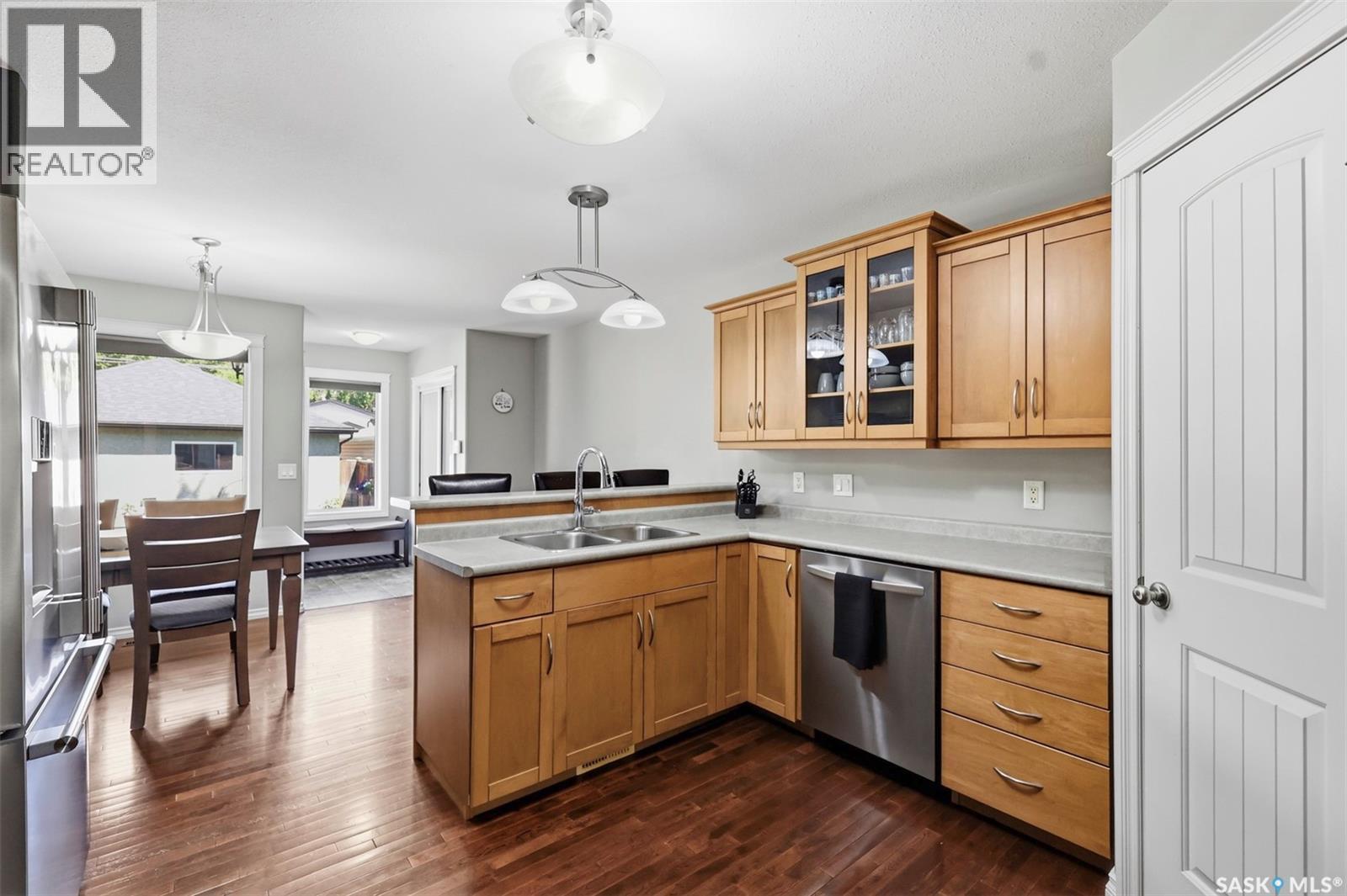217 Isabella Street E, Saskatoon, SK - Indoor Photo Showing Kitchen With Double Sink