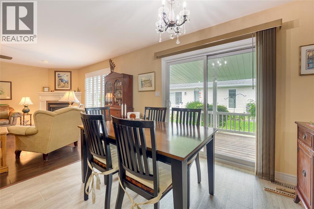 5600 Blackwell Sideroad Unit# 465, Sarnia, ON - Indoor Photo Showing Dining Room With Fireplace
