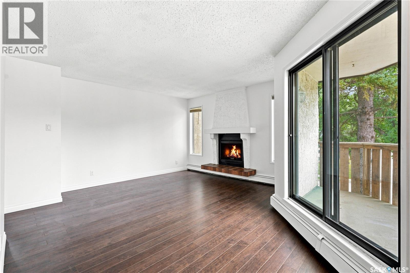 301 116 111Th Street, Saskatoon, SK - Indoor With Fireplace