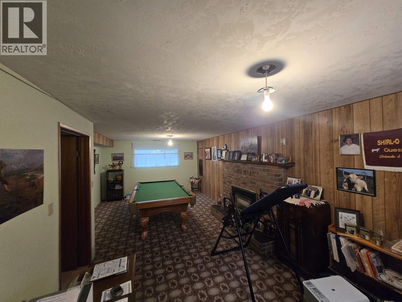 575 Harcourt Avenue, Quesnel, BC - Indoor Photo Showing Other Room With Fireplace