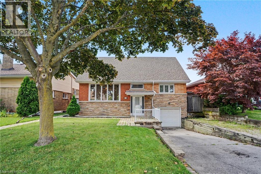 Brick and stone façade residence with a shingled roof - 100 Hardale Crescent, Hamilton, ON - Outdoor
