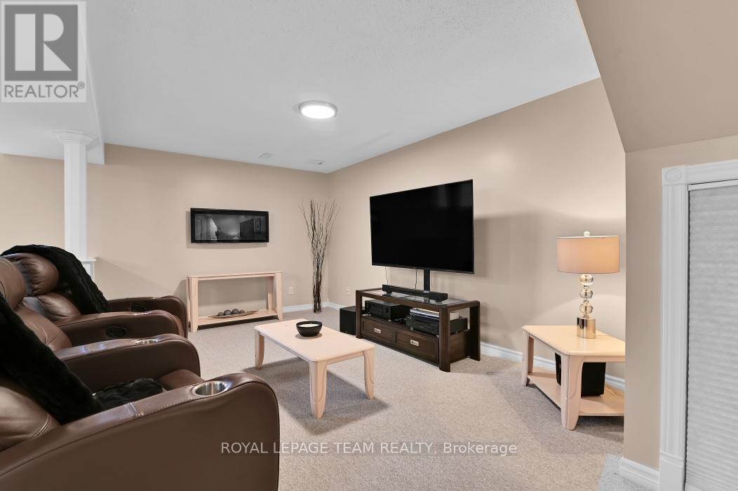 Perfect place for teens or family time - 4121 Wolfe Point Way, Ottawa, ON - Indoor With Fireplace