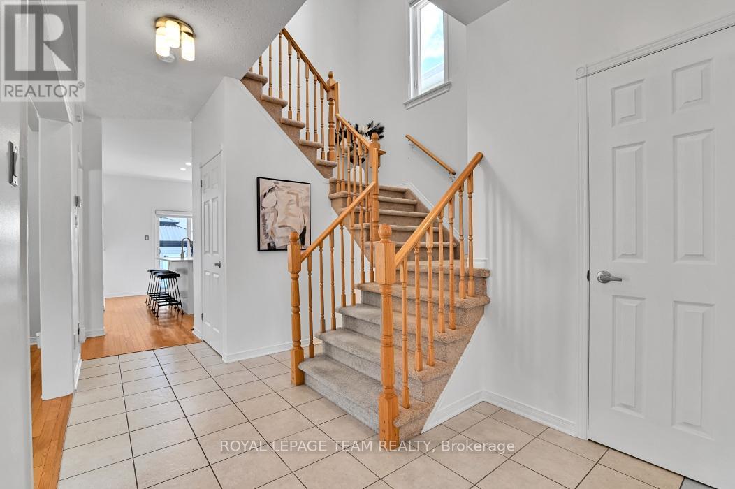 Foyer has access to garage & powder room - 4121 Wolfe Point Way, Ottawa, ON - Indoor Photo Showing Other Room