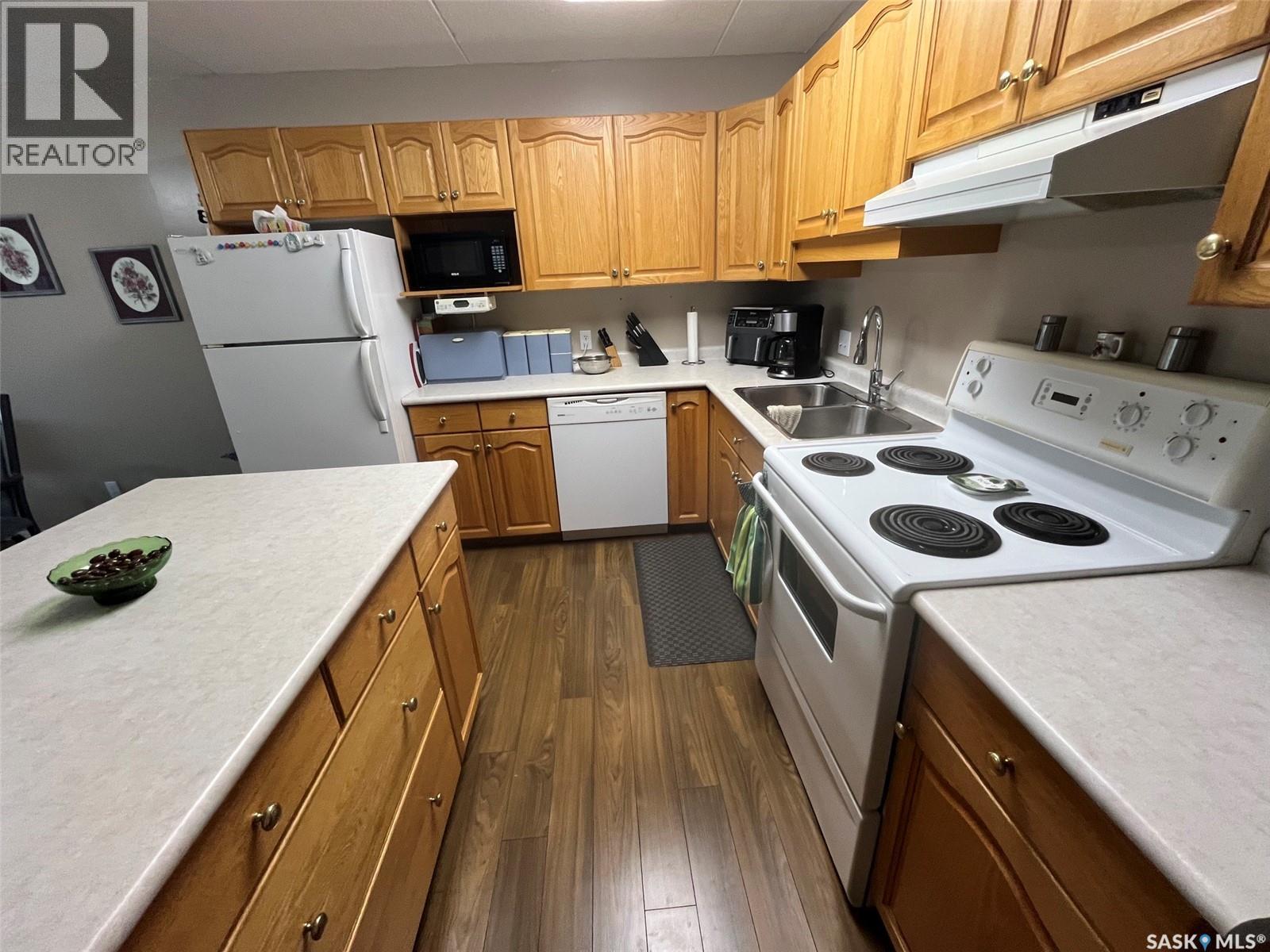 Unit306 1 26Th Street E, Prince Albert, SK - Indoor Photo Showing Kitchen With Double Sink