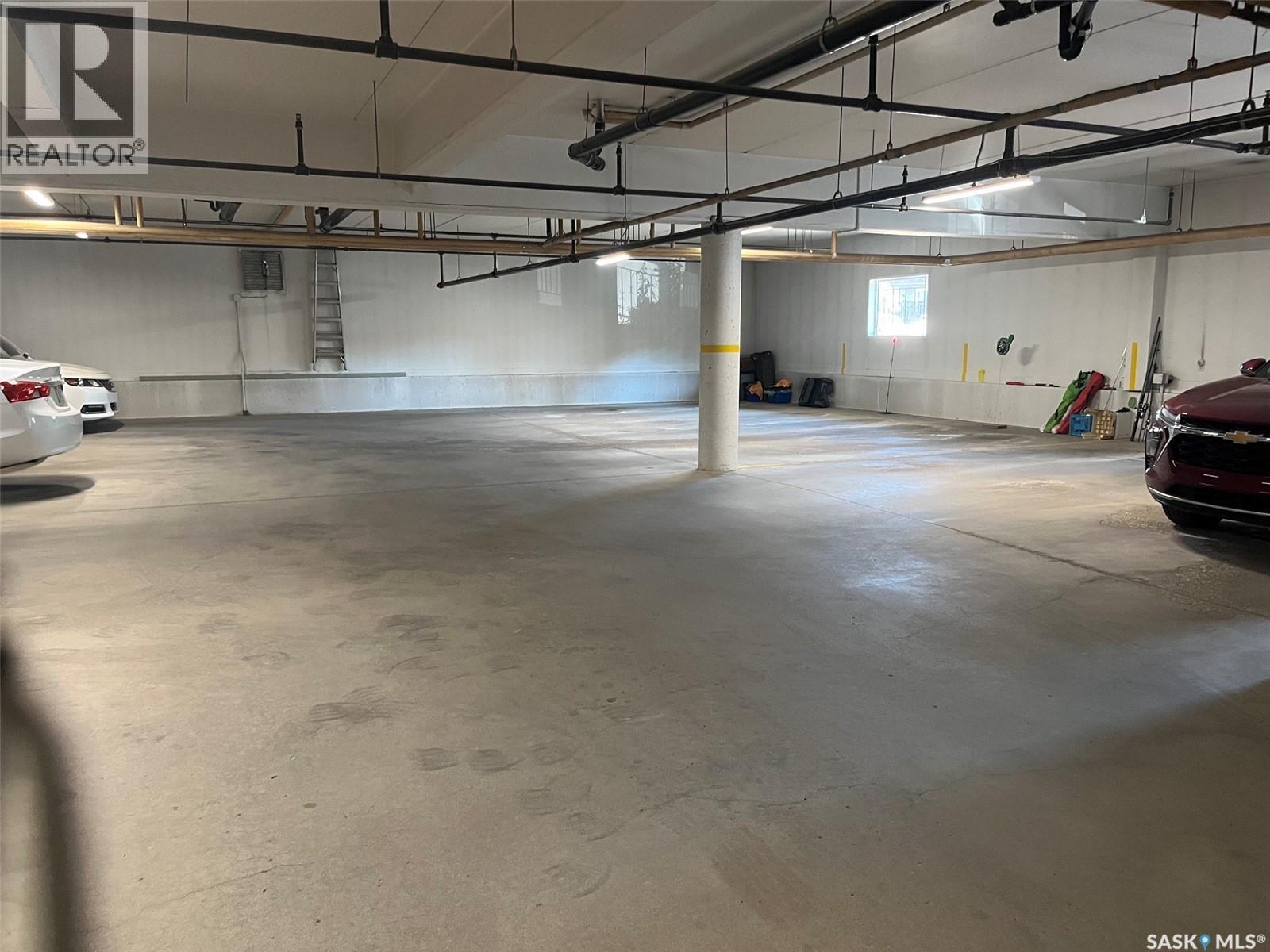 Unit306 1 26Th Street E, Prince Albert, SK - Indoor Photo Showing Garage